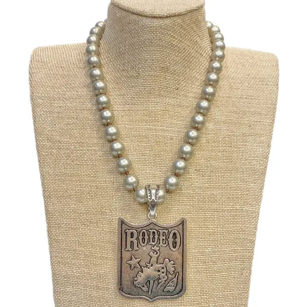 Horse Rider Rodeo Pendant On Faux Navajo Pearl Necklace